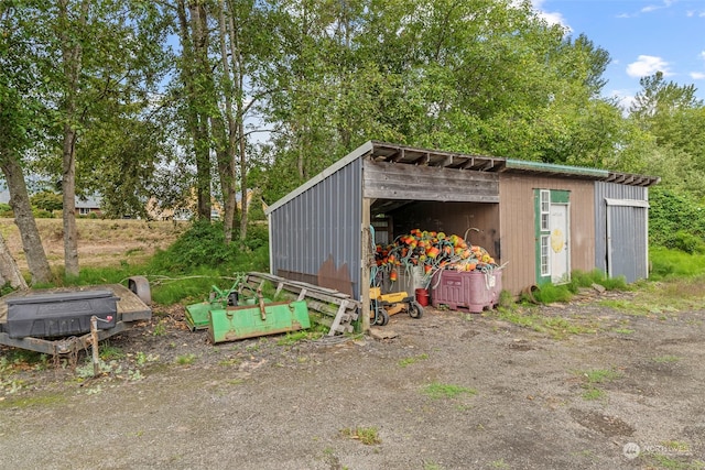 view of outbuilding with an outdoor structure