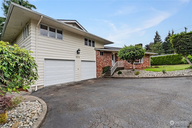 view of front of home featuring a garage