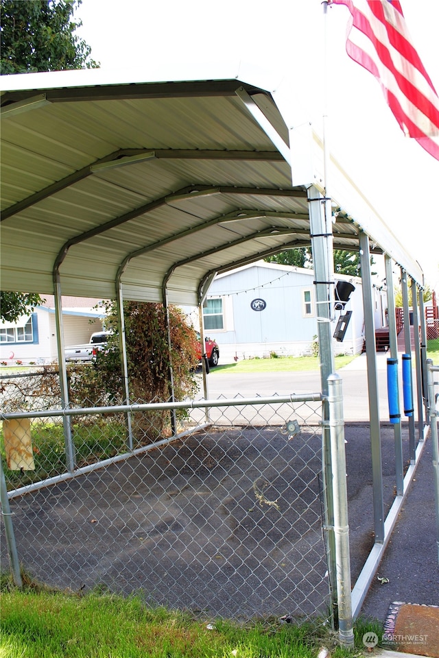 view of parking with a carport