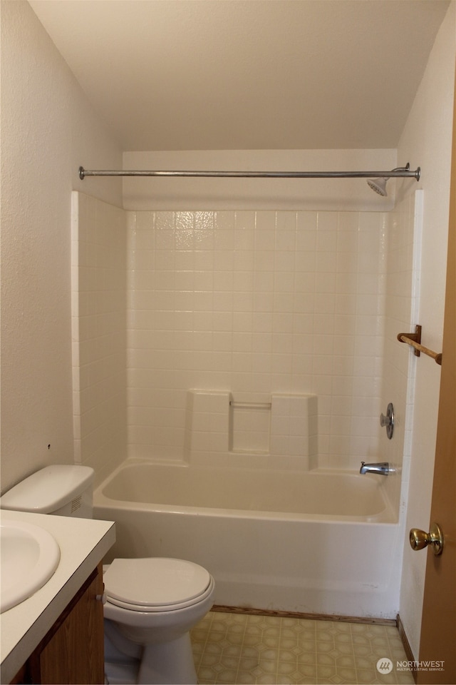 full bathroom with washtub / shower combination, vanity, and toilet