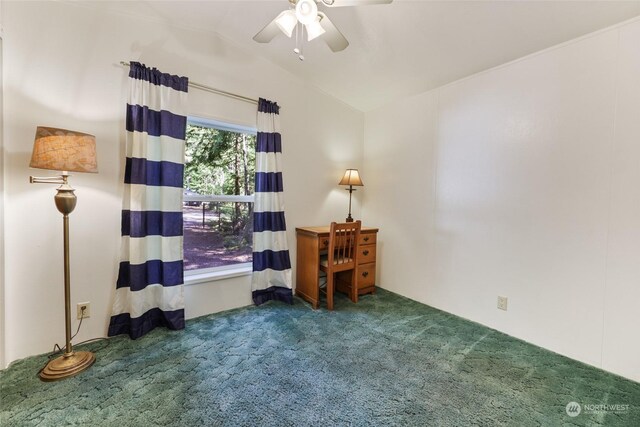 bedroom with lofted ceiling, dark colored carpet, and ceiling fan