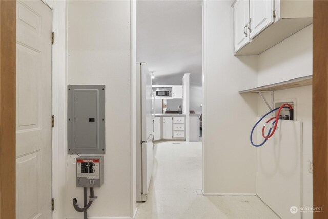 utility room featuring electric panel