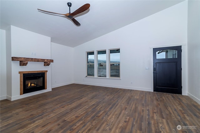 unfurnished living room with dark hardwood / wood-style floors, ceiling fan, and lofted ceiling