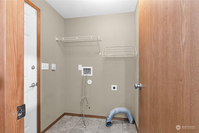 washroom featuring baseboards, laundry area, hookup for a washing machine, and hookup for an electric dryer