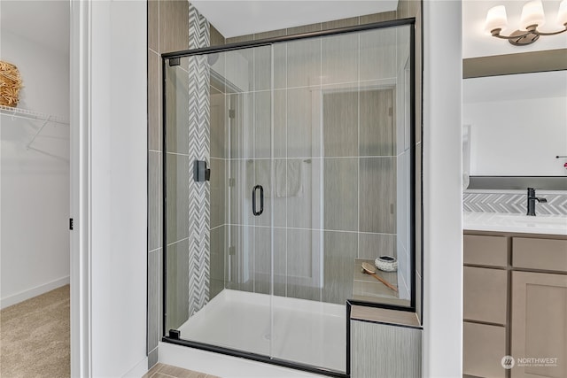 bathroom featuring vanity and walk in shower