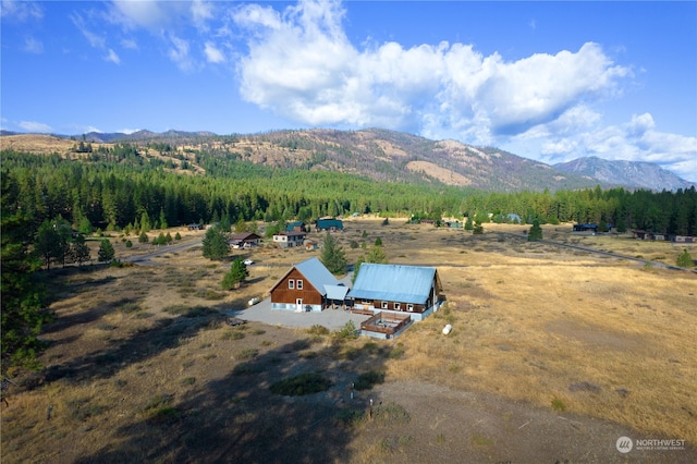 bird's eye view featuring a mountain view and a rural view