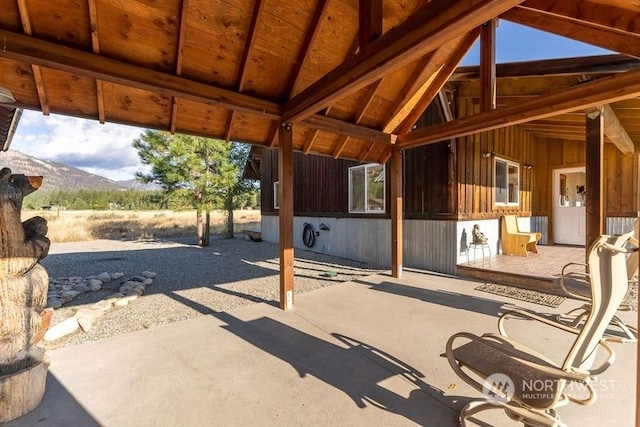 view of horse barn with a mountain view