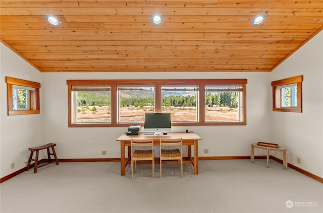 home office featuring lofted ceiling, plenty of natural light, light colored carpet, and wood ceiling