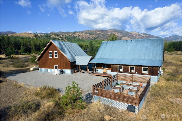 bird's eye view featuring a mountain view and a wooded view