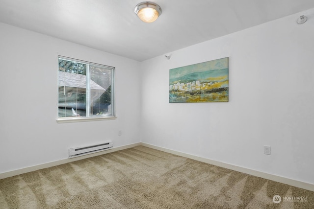 carpeted empty room featuring baseboards and a baseboard heating unit