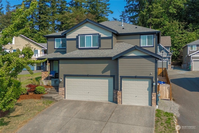 front of property with a garage