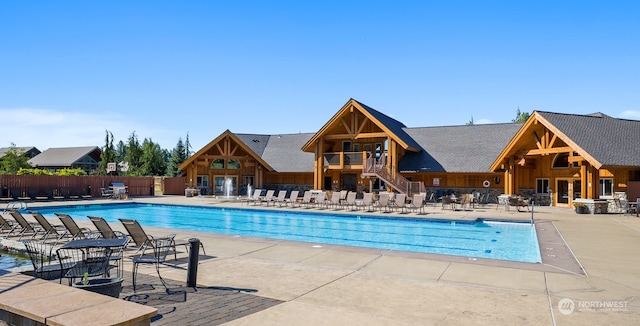 view of swimming pool with a patio