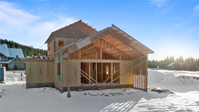 view of snow covered property