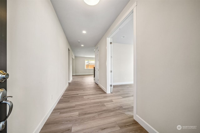 hallway featuring light hardwood / wood-style floors