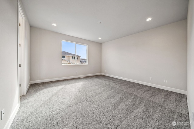 spare room featuring carpet flooring