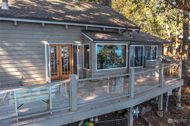 wooden deck featuring french doors