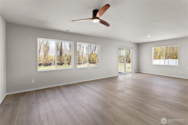518 Chinook Winds Ln, Tieton, WA 98947 - interior space with ceiling fan, baseboards, visible vents, and wood finished floors