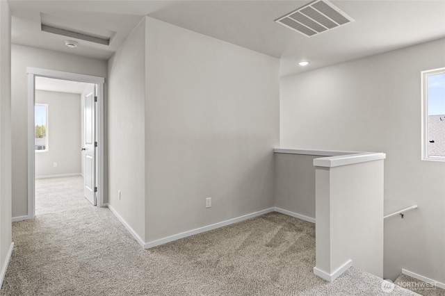 518 Chinook Winds Ln, Tieton, WA 98947 - corridor with a healthy amount of sunlight, an upstairs landing, visible vents, and carpet