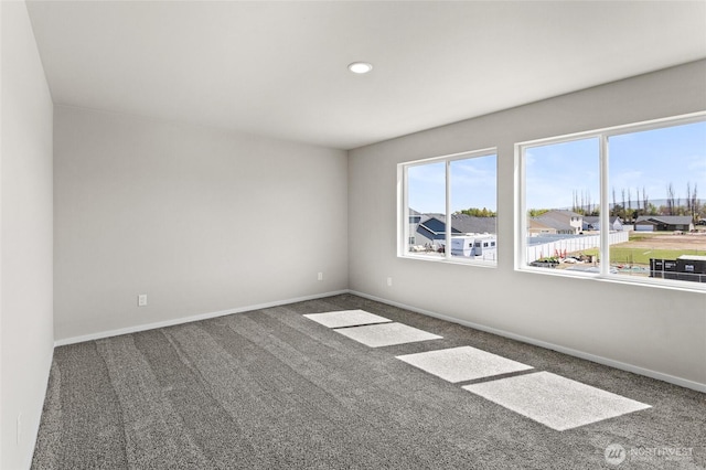 518 Chinook Winds Ln, Tieton, WA 98947 - carpeted spare room featuring baseboards, a healthy amount of sunlight, and recessed lighting