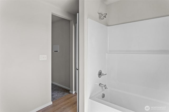 518 Chinook Winds Ln, Tieton, WA 98947 - bathroom with baseboards, shower / bath combination, and wood finished floors