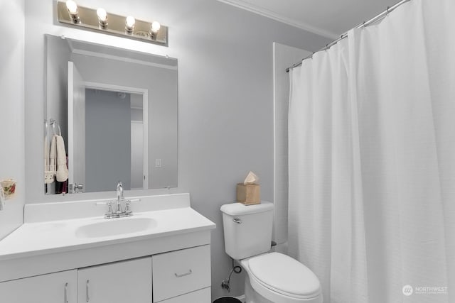 bathroom featuring walk in shower, toilet, ornamental molding, and vanity