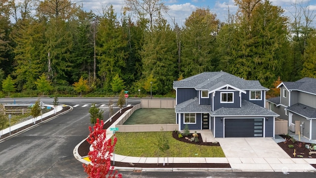 front facade with a front lawn