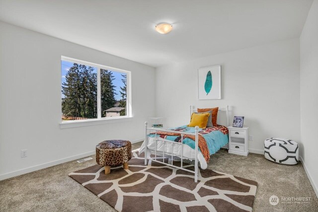 bedroom featuring carpet flooring