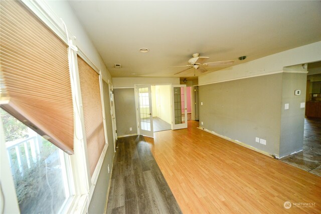 empty room featuring hardwood / wood-style floors and ceiling fan