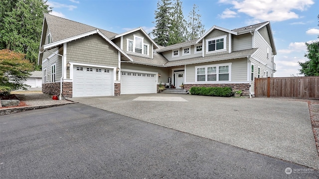 craftsman inspired home featuring a garage