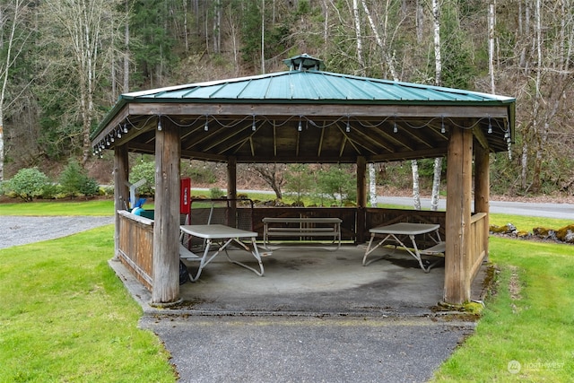 view of community with a yard and a gazebo