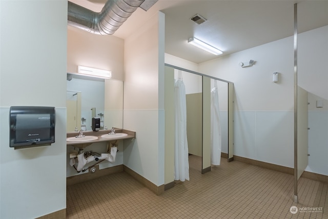 bathroom with vanity and walk in shower