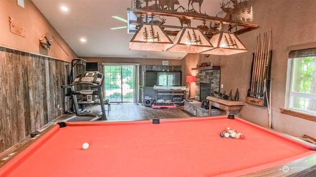 recreation room featuring billiards, lofted ceiling, and a fireplace