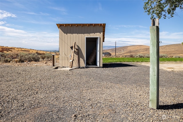 view of outdoor structure featuring a mountain view