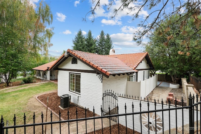 view of front of house with central AC unit