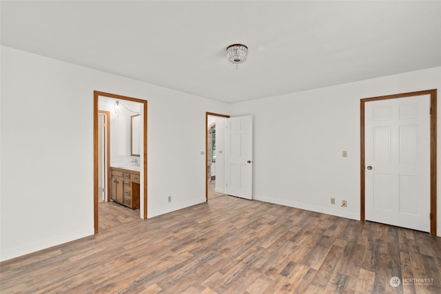 spare room featuring hardwood / wood-style floors