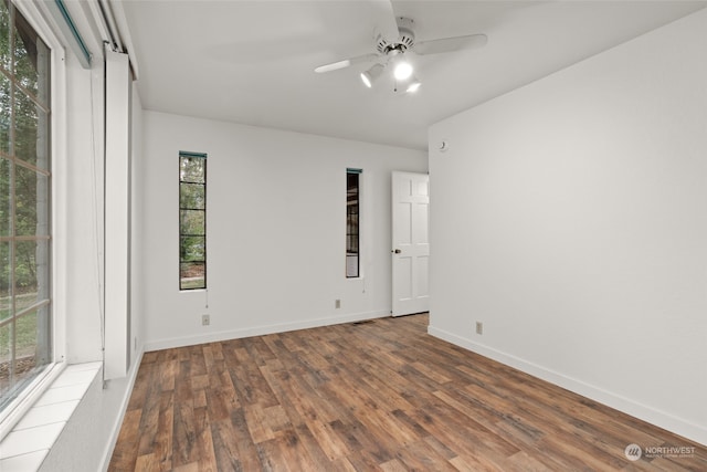 empty room with wood-type flooring and ceiling fan