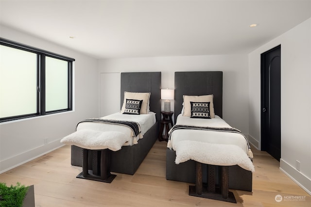 bedroom featuring light hardwood / wood-style floors