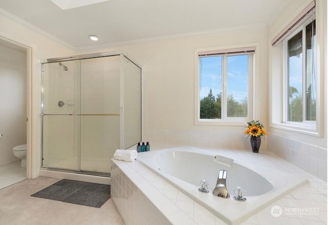 bathroom with ornamental molding, toilet, and shower with separate bathtub