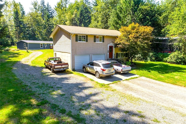 garage with a yard