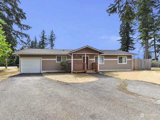 single story home featuring a garage