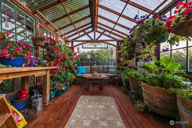 wooden terrace featuring an outdoor hangout area