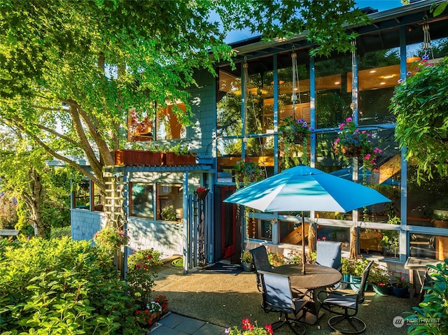 rear view of house featuring a patio area