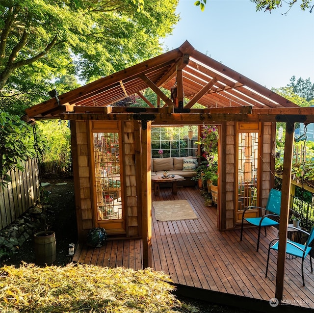 deck featuring outdoor lounge area