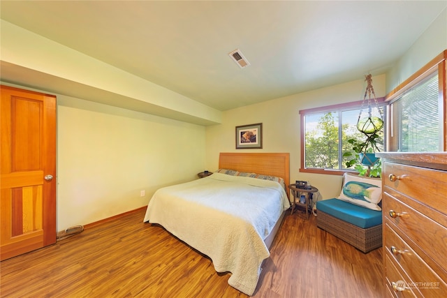 bedroom featuring hardwood / wood-style flooring