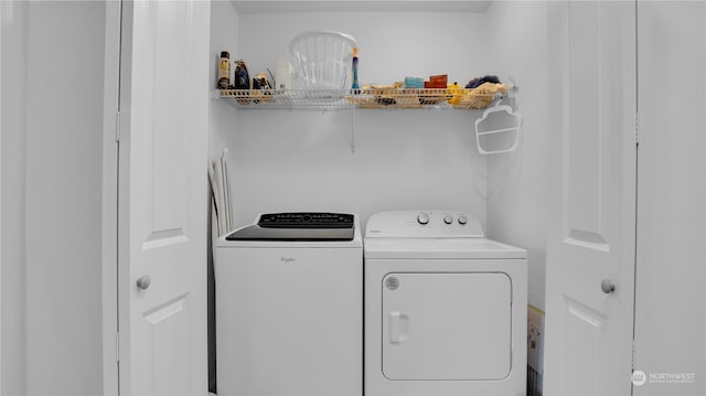 laundry area with washer and clothes dryer