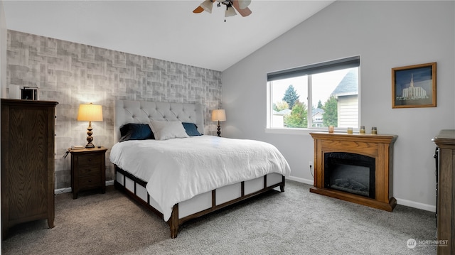 bedroom featuring lofted ceiling, ceiling fan, and light carpet