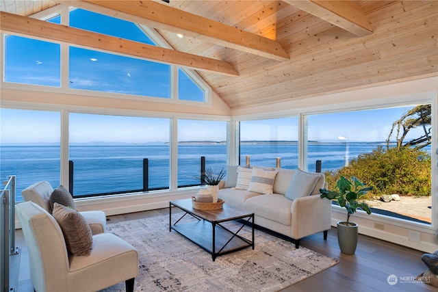 living room with hardwood / wood-style flooring, high vaulted ceiling, a water view, and beamed ceiling