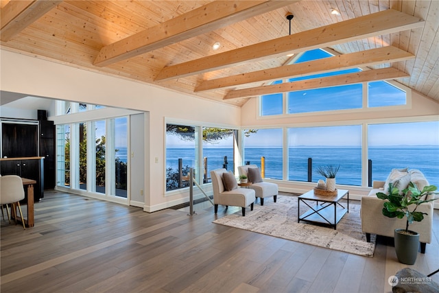 living room featuring wooden ceiling, lofted ceiling with beams, a water view, and hardwood / wood-style floors