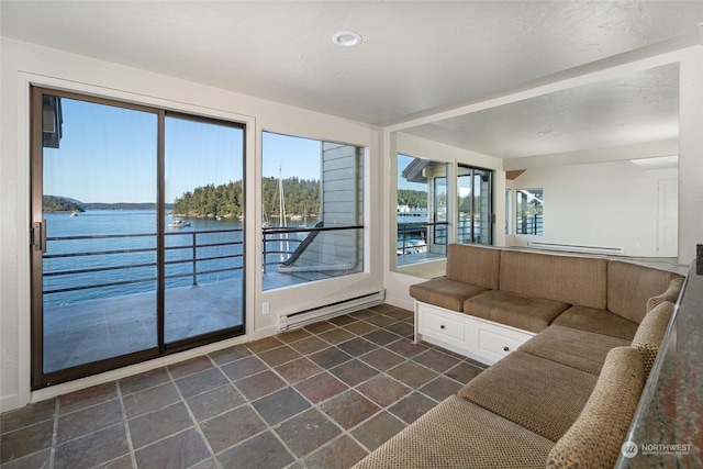 241 Warbass Way Unit A303, Friday Harbor, WA 98250 - living area with baseboard heating and a water view