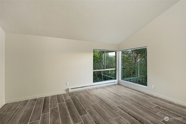 unfurnished room with lofted ceiling, baseboard heating, and dark hardwood / wood-style flooring